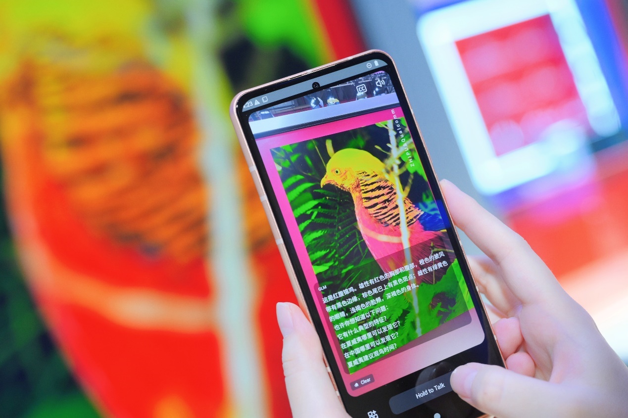 A person holding a phone
Description automatically generated